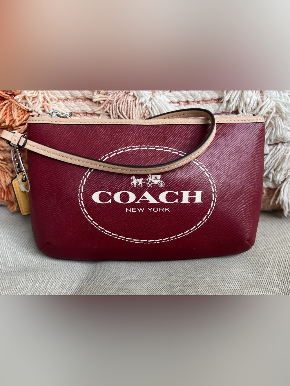 COACH Cherry Red Wristlet with Tan Strap
